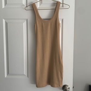 Nude fitted mini dress. Size XS